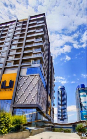 Comfort Inn 1BHK Elysium Tower Family Apartment